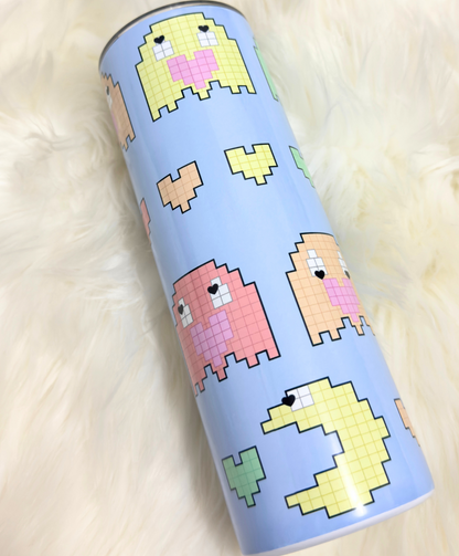 20oz stainless steel tumbler with pixelated ghost design on a light blue background
